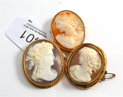 Lot 401 - Three cameo brooches, all frames unmarked