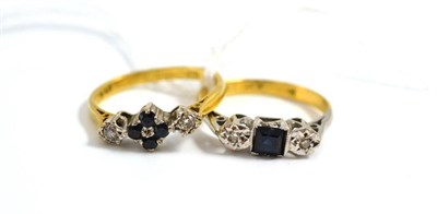 Lot 408 - A sapphire and diamond three stone ring and an 18ct gold sapphire and diamond ring (2)