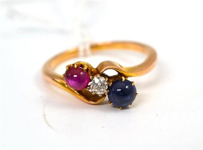 Lot 420 - Ruby, sapphire and diamond three stone twist ring