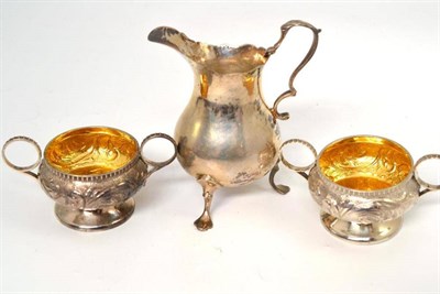 Lot 429 - Pair of Victorian silver gilt salts and a George III silver cream jug