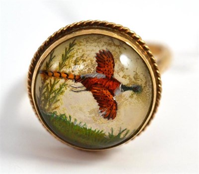 Lot 445 - A ring set with Essex Crystal of a Pheasant in flight