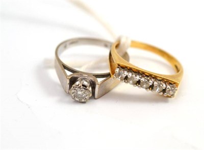 Lot 447 - A diamond solitaire ring stamped 18ct and a five stone ring (2)