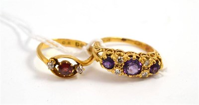 Lot 450 - An 18ct gold garnet and diamond three stone ring, hallmarked Chester 1908 and an amethyst and...