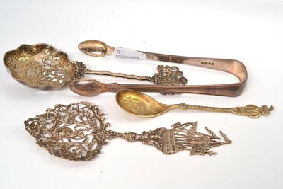 Lot 458 - Silver sugar tongs; two Dutch style silver spoons; Danish silver spoon by David Anderson