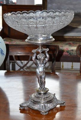 Lot 471 - An Elkington & Co electroplated centrepiece modelled as a cherub holding a cut glass bowl, numbered