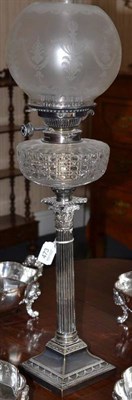 Lot 473 - An electroplate oil lamp, early 20th century, of Corinthian column form on a swept square base with