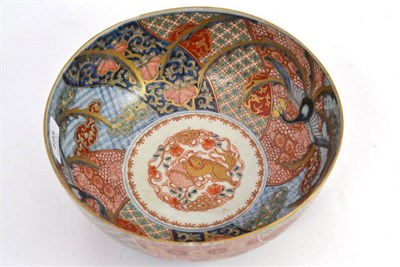 Lot 495 - A late 19th century Japanese Imari bowl decorated with phoenix and diaper borders, 25cm diameter