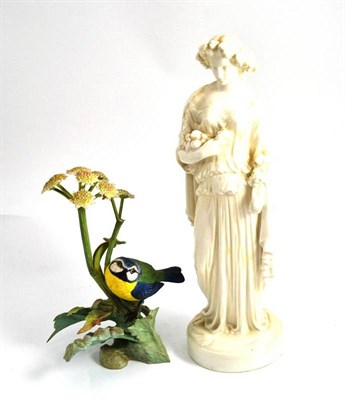 Lot 499 - A Royal Worcester model of a blue tit with certificate and a Derby white glazed classical figure