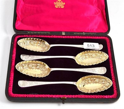 Lot 513 - Set of four Victorian silver gilt berry spoons