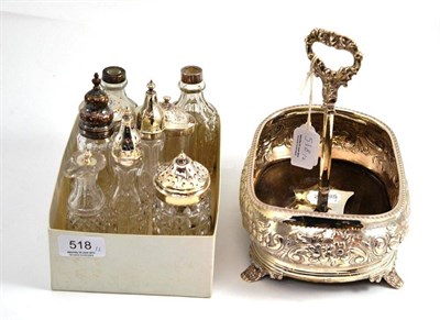 Lot 518 - Embossed silver cruet stand and nine assorted bottles