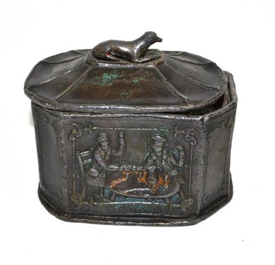 Lot 527 - A lead tobacco box of sarcophagus shaped form, 13cm wide