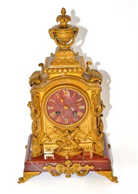 Lot 534 - A Louis XV style gilt metal striking mantel clock