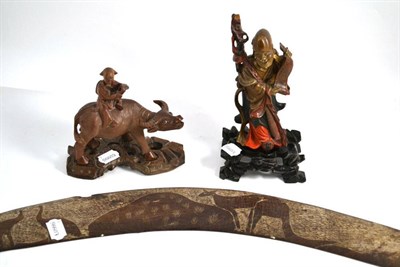 Lot 552 - Boomerang and two Oriental carvings