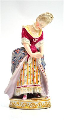 Lot 559 - A painted Viennese figure of a lady, height 14cm