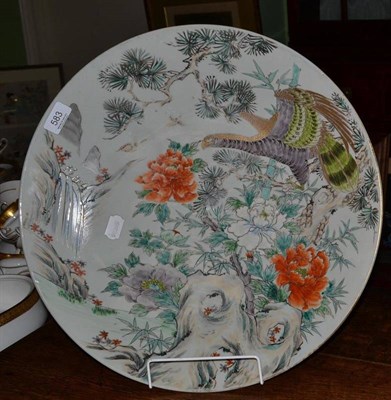 Lot 583 - A late 19th century Japanese charger decorated in the Chinese taste with an eagle perched...