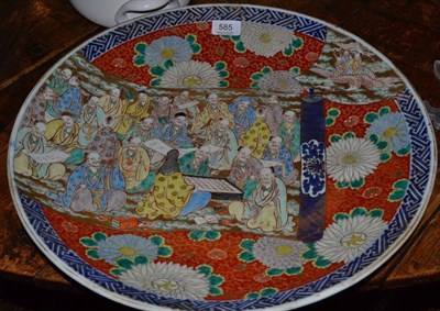 Lot 585 - A late 19th century Japanese Imari charger decorated in typical palette with a panel of...