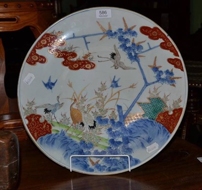 Lot 586 - A late 19th century Japanese Arita charger decorated in under glaze blue, colours and gilding...