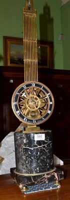 Lot 592 - A marble column mantel timepiece with gridiron type pendulum, bearing Huguienin A Paris, 20th...