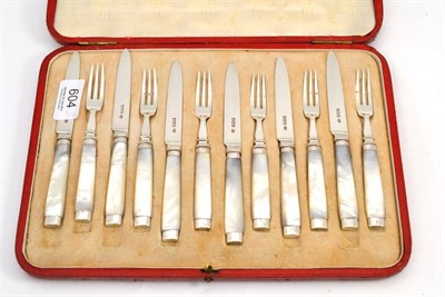 Lot 604 - A cased set of silver and mother-of-pearl fruit knives and forks