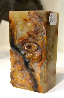 Lot 606 - A Chinese carved agate rectangular section vase or brush pot, circa 1900, worked in flat relief...