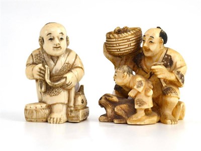 Lot 615 - A Japanese carved elephant ivory netsuke, circa 1910, as a man with child and rabbits, 4.5cm;...