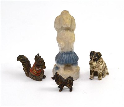 Lot 644 - Two miniature cold painted bronze dogs and a squirrel and a Wade poodle (4)