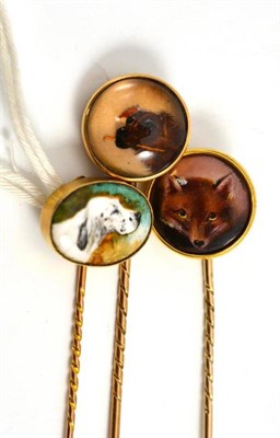 Lot 651 - Enamel fox stick pin, dog stick pin and glass dog pin (3)