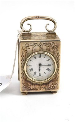 Lot 657 - A George V silver cased carriage timepiece, with white circular enamel dial, the rectangular...