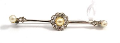 Lot 662 - A cultured pearl and diamond set bar brooch