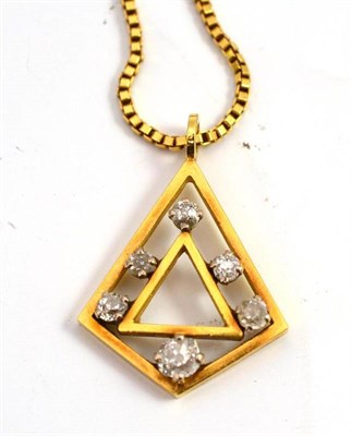 Lot 677 - A triangular pendant set with old cut diamonds, on a box link chain