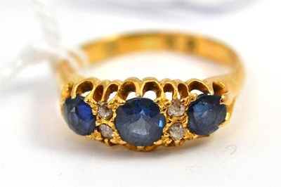 Lot 678 - A sapphire and diamond ring