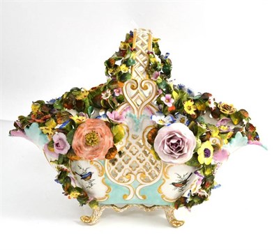 Lot 686 - Dresden flower encrusted basket, diameter 40cm