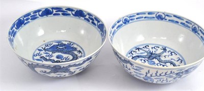 Lot 690 - Two Chinese blue and white bowls, decorated with dragons, diameter 20cm