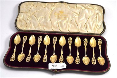 Lot 702 - Set of twelve Victorian silver gilt teaspoons in fitted case