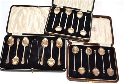 Lot 721 - Three sets of cased silver tea and coffee spoons