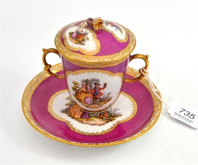 Lot 735 - A Meissen pink ground twin handled cup, cover and saucer (cup 8cm)