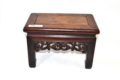 Lot 750 - Small Chinese hardwood stand, 33cm wide