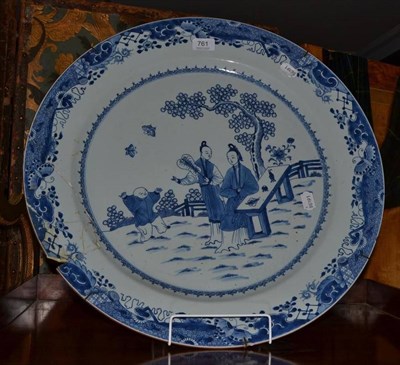 Lot 761 - A 18th century blue and white charger with a boy and figures in a landscape (a.f.)