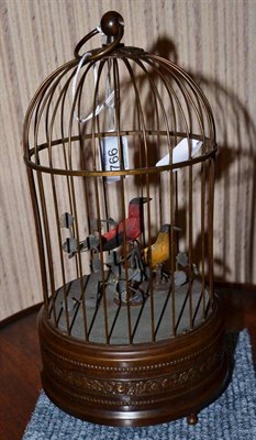 Lot 766 - An early 20th century automaton brass bird cage, height 26cm