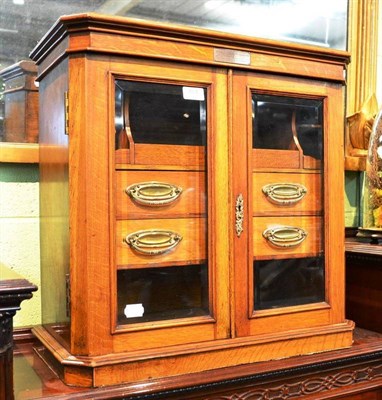 Lot 784 - Oak smokers cabinet presented January 2nd 1910, width 58cm