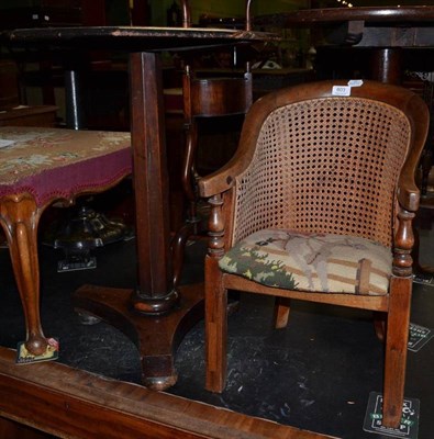 Lot 803 - A Victorian rosewood chess top tripod table, height 67cm and a child's bergere chair