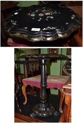 Lot 812 - A Victorian papier mache flip top tripod table, height 69cm