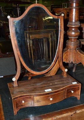 Lot 818 - George III mahogany serpentine dressing table mirror and two small toilet mirrors