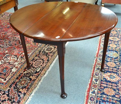 Lot 840 - George III mahogany padfoot table, 100cm extended