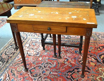 Lot 841 - A 19th century fold over tea table, later inlaid with bone and floral marquetry, raised on stop...