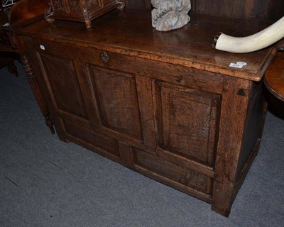 Lot 848 - An oak panelled chest (with alterations)