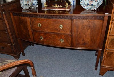 Lot 854 - An Edwardian mahogany bow fronted sideboard, width 152cm