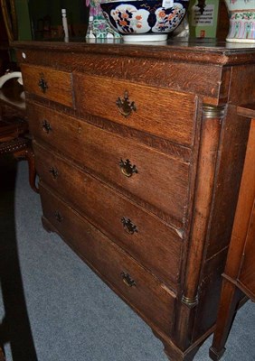 Lot 856 - An 18th century oak chest of two short and three long drawers