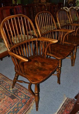 Lot 862 - A set of four oak and elm Windsor chairs, of recent date