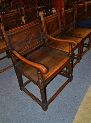 Lot 873 - A set of ten 17th century style dining chairs with lozenge carved back supports including two...